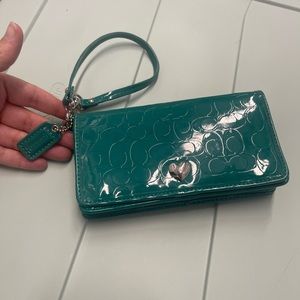 Green patent leather coach wristlet